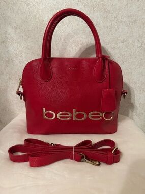bebe Red Pebbled Leather Satchel with Gold Logo Accent with strap.
